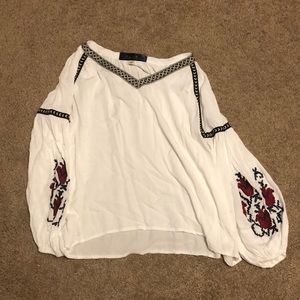 White flowy top with puffy sleeves